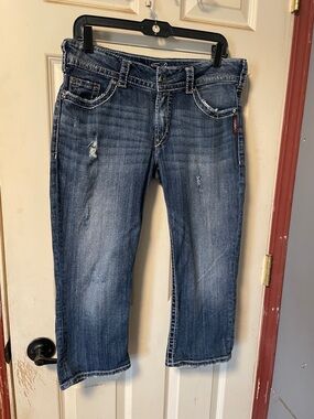 Silver Jeans Faded Blue Cropped Distressed Ankle Jeans